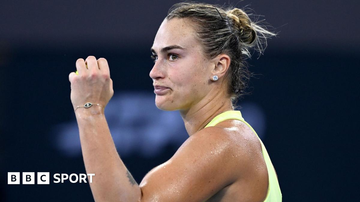 Aryna Sabalenka celebrates after beating Madison Keys