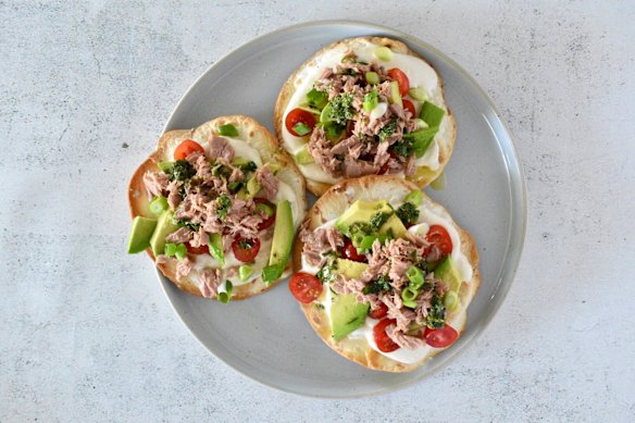 Prep ahead, then assemble these Mediterranean tuna and whipped hummus crisps to order.
