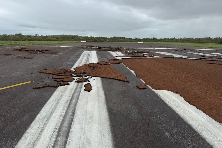 airstrip peeled away, revealing dirt underneath