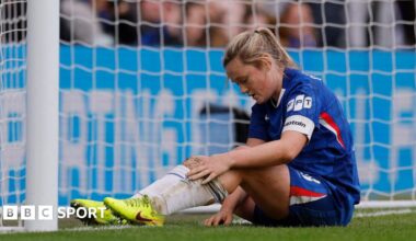 Erin Cuthbert sits on the floor frustrated after missing a golden chance to score against Arsenal