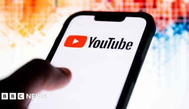 In this photo illustration, a YouTube logo seen displayed on a smartphone.