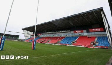 Luke Littler celebrates winning the 2026 PDC World Championship as tickertape falls