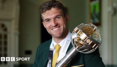 Wiaan Mulder holding the World Test Championship trophy at Lord's