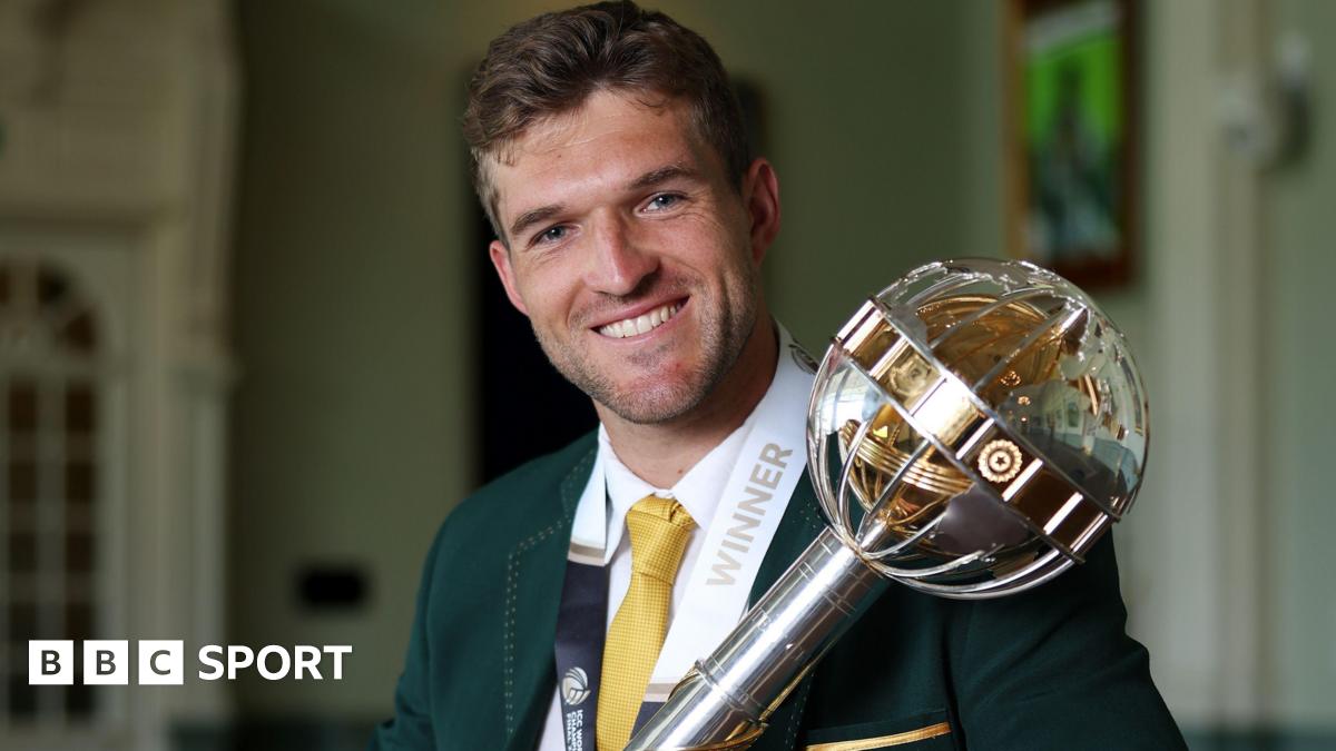 Wiaan Mulder holding the World Test Championship trophy at Lord's