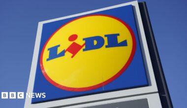 A close-up of a large Lidl sign