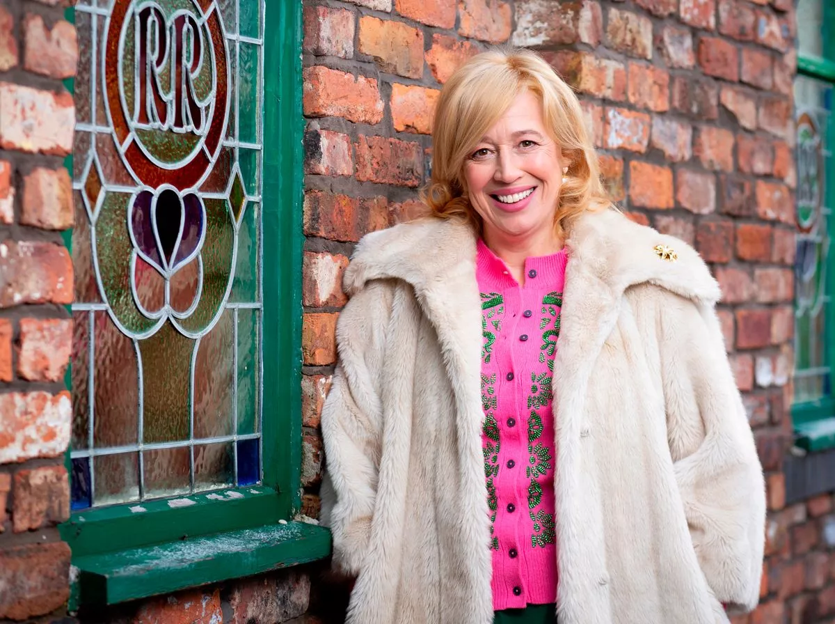 Katy Cavanagh as Julie Carp on Coronation Street