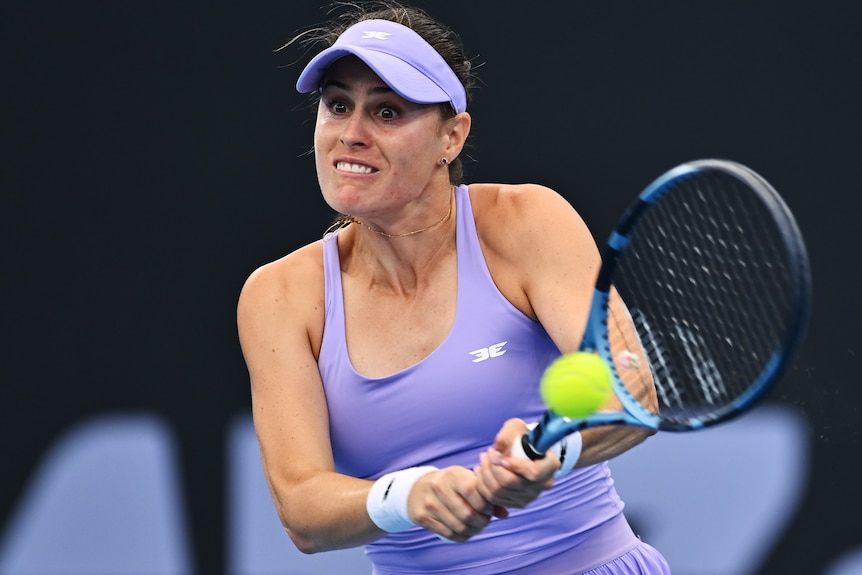  Kimberly Birrell of Australia plays a backhand at the Brisbane International.