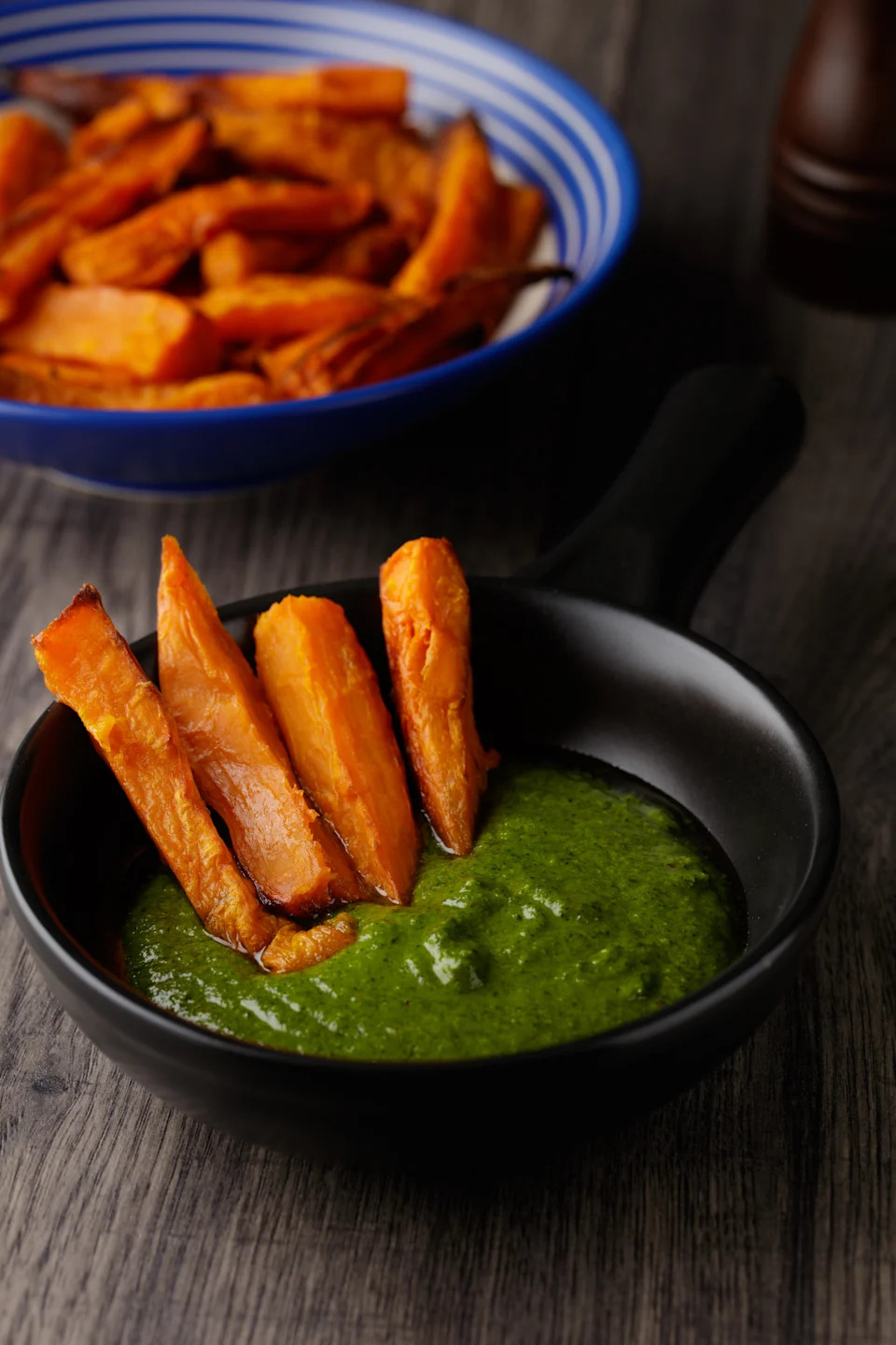 Homemade roasted sweet crisps with vegan walnut coriander pesto