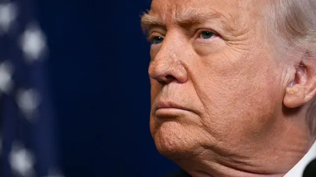 US President Donald Trump dey look as Israeli Prime Minister Benjamin Netanyahu (off frame) dey follow journalists tok during one joint press conference for Trump Mar-a-Lago residence for Palm Beach, Florida, on 29 December 29 2025