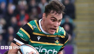 Northampton Saints flanker Josh Kemeny being tackled by a Sale Sharks player