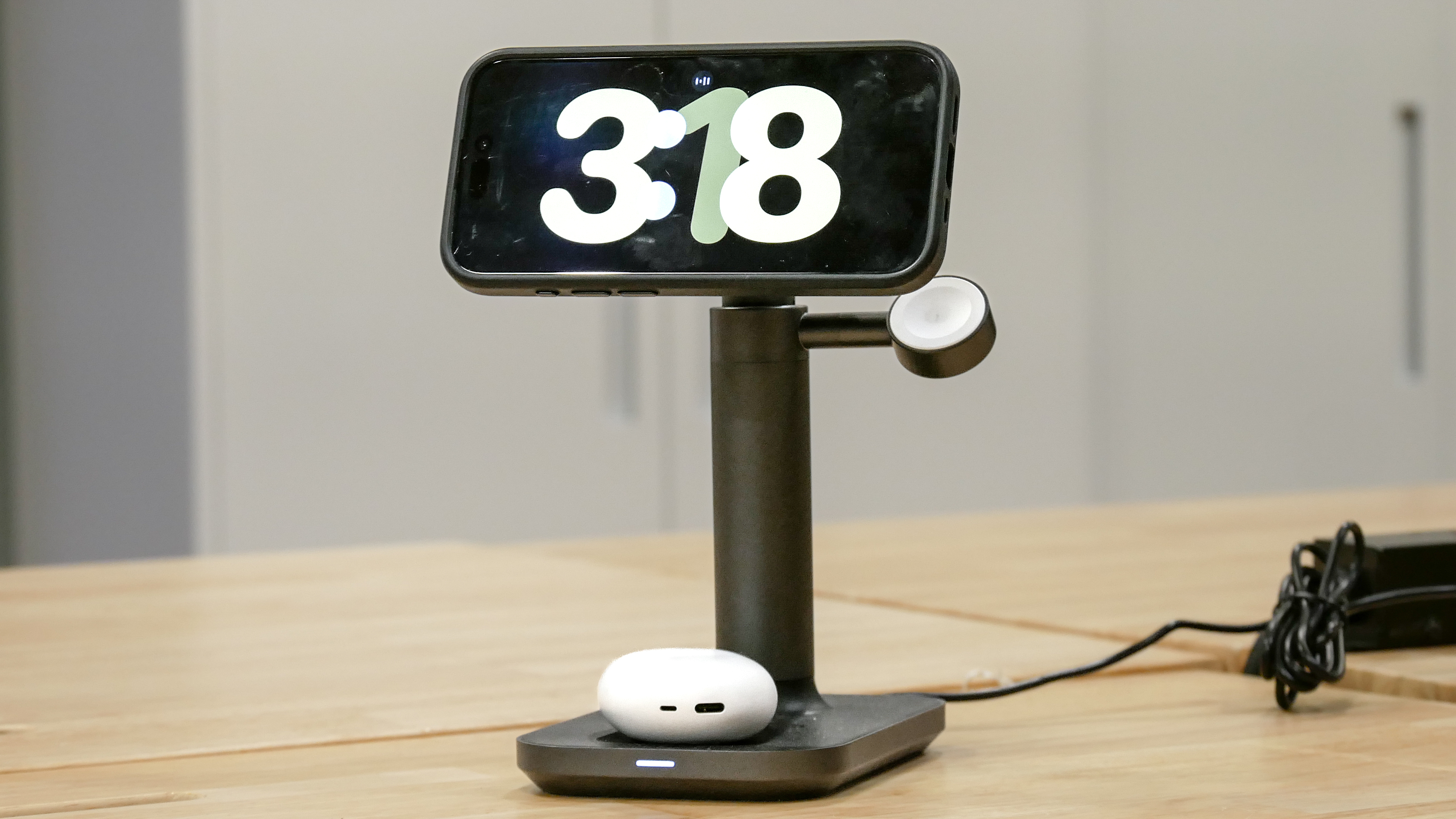 Mophie 3-in-1 Extendable MagSafe Stand on top of table.