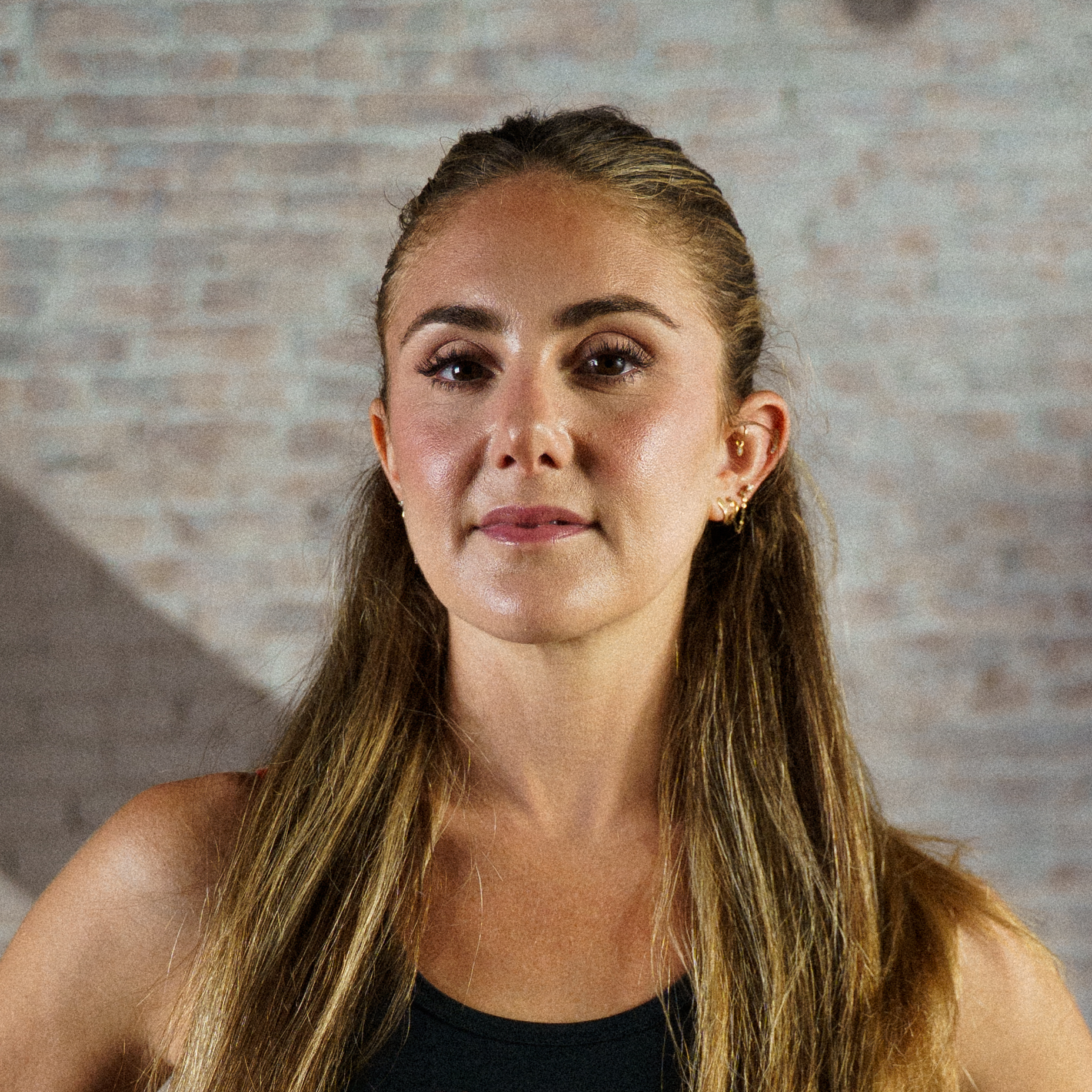 Woman looks at camera