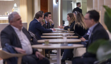 Climate change drops down global elite's list of pressing concerns