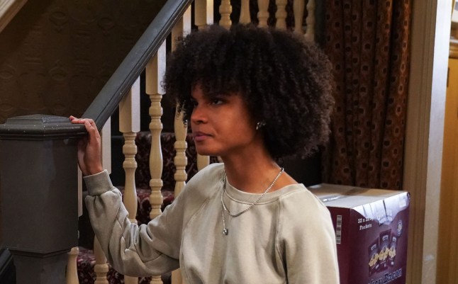 Jasmine Fisher and Max Branning argue in the hallway of the Vic in EastEnders