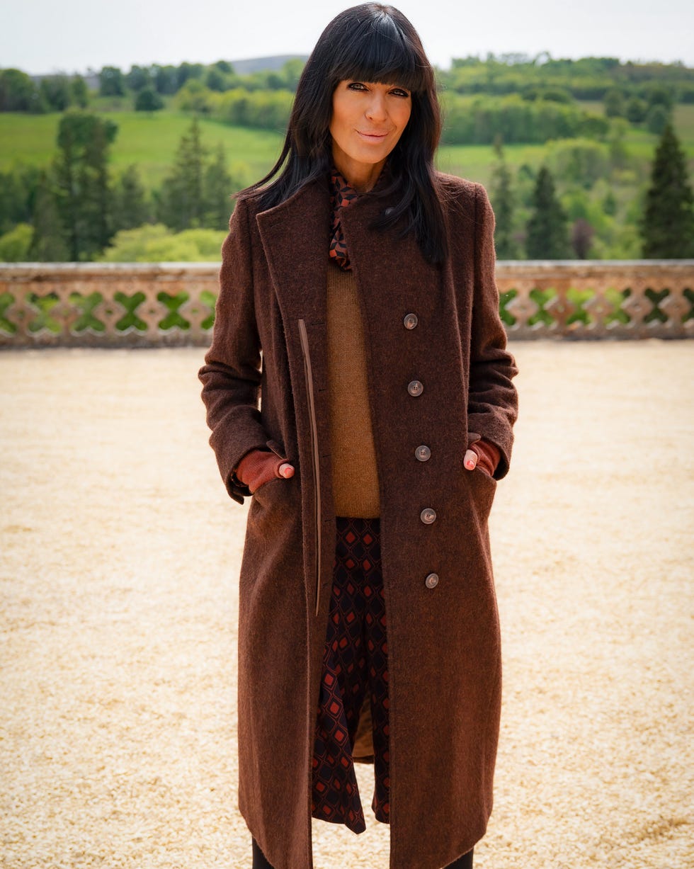 claudia winkleman traitors outfits