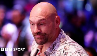 Tyson Fury wearing a white shirt with roses