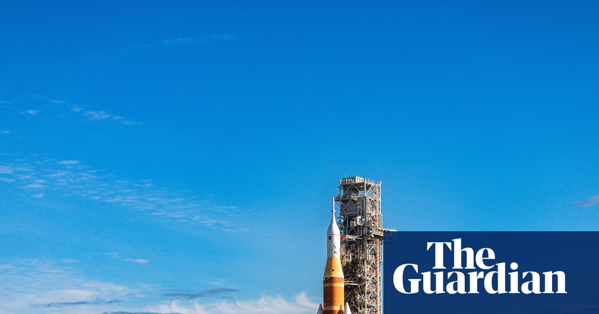 Nasa moon rocket creeps to its launch pad in preparation for astronaut flight | Nasa