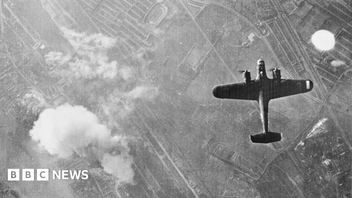 A black and white image of German bombers flying overhead in the UK.