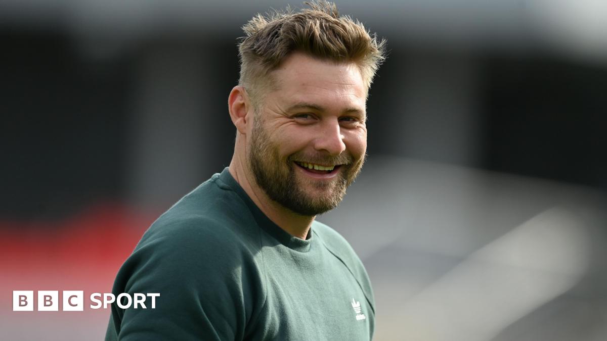 Luke Wright smiles towards the camera