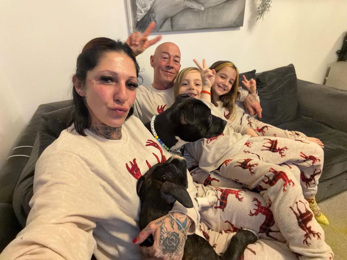 John Hendy with wife Nina and their two children