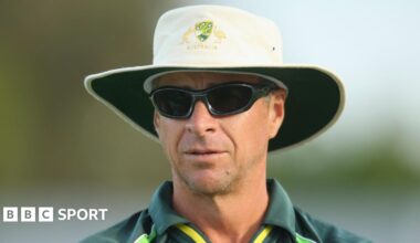 Troy Cooley looks on