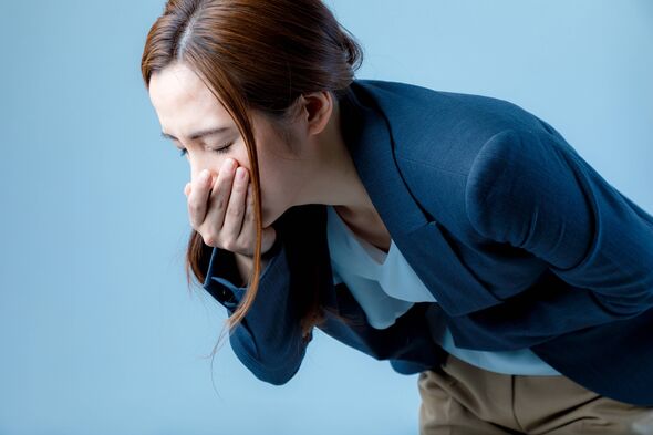 young woman feeling nauseated