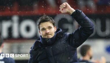 Rangers players salute their fans at Pittodrie