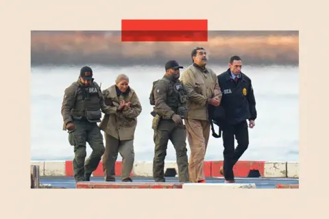 XNY/Star Max/GC Images Nicolas Maduro and his wife, Cilia Flores, are seen in handcuffs after landing at a Manhattan helipad, escorted by Federal agents
