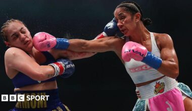 Amanda Serrano lands a right jab on Reina Tellez