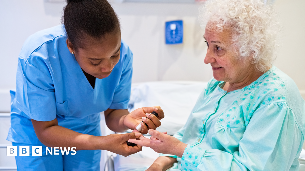 A graphic design of red, black and cream, with arrows, a pound sign and a hand holding three credit cards.