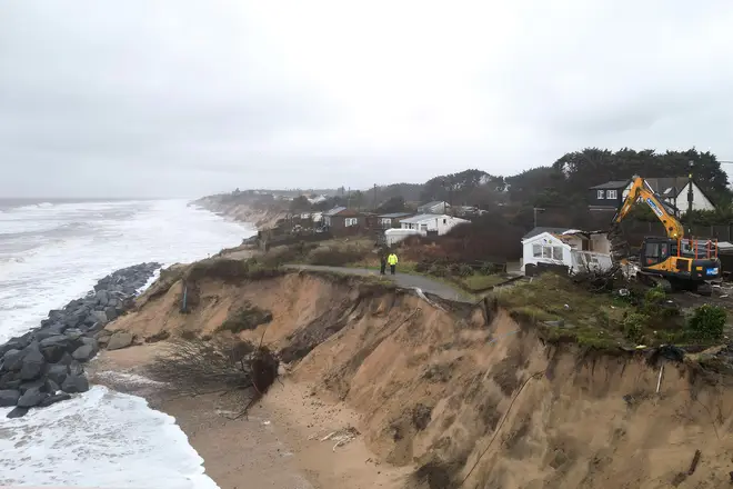 Properties being demolished close to the cliff edge at Hemsby in Norfolk