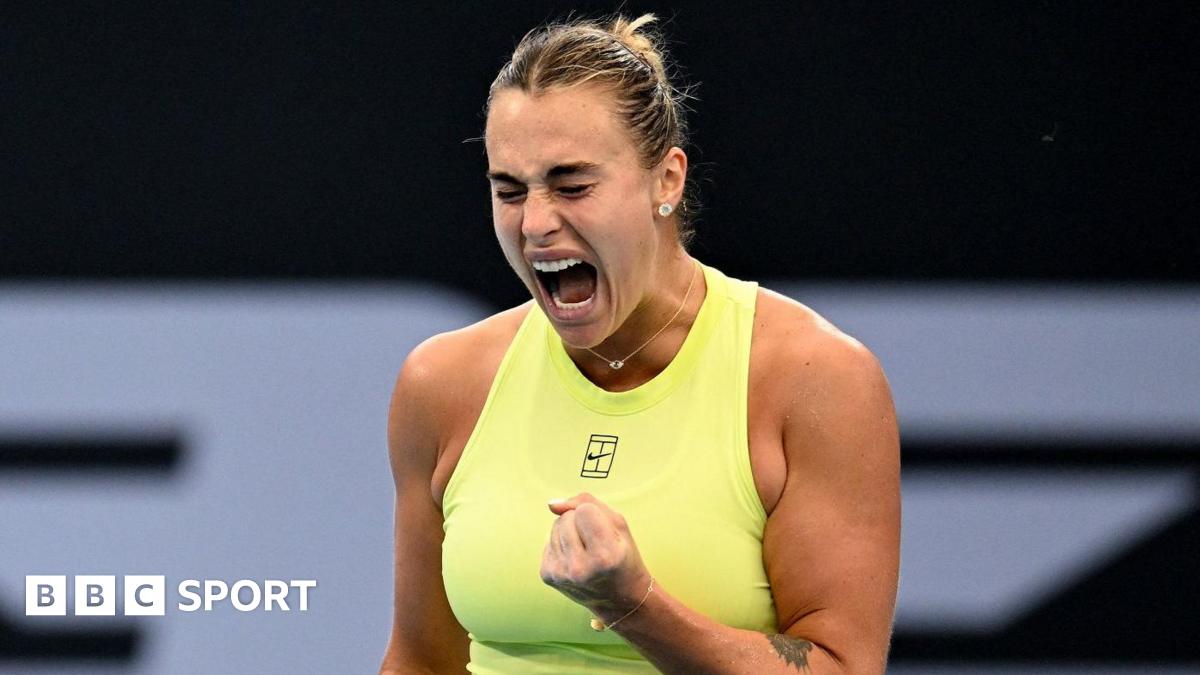 Aryna Sabalenka celebrates with a clenched fist