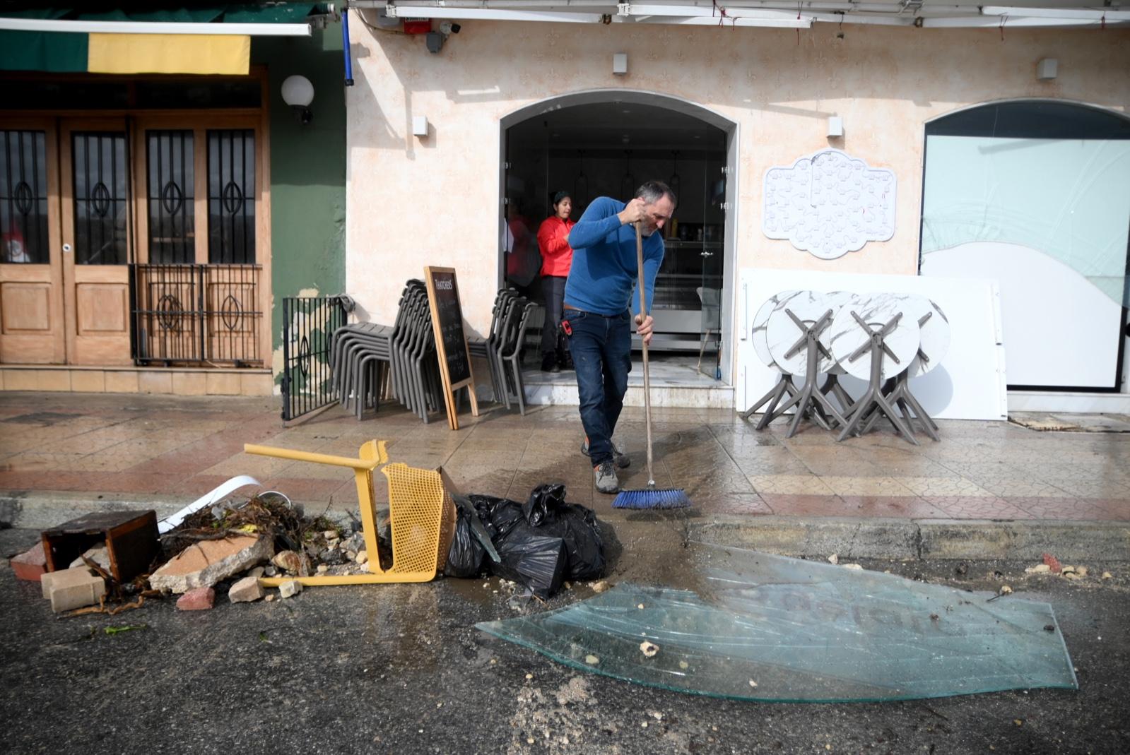 Shopfronts in Marsascala were damaged by the storm. Photo: Jonathan Borg