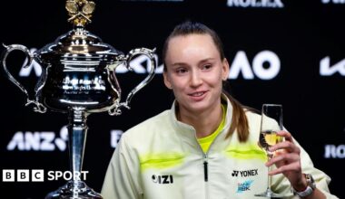 Elena Rybakina drinks champagne at her news conference after winning the Australian Open