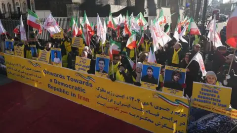 PA Media Activists from the Association of Anglo-Iranian Women in the UK during a rally outside 10 Downing Street, Whitehall, central London, to show solidarity with the protests in Iran over the country's ailing economy. Picture date: Saturday January 3, 2026.