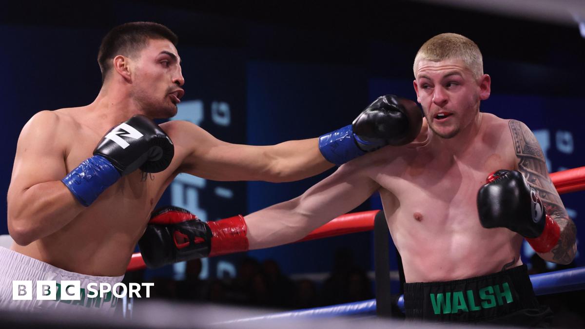 Carlos Ocampo and Callum Walsh aim punches at each other