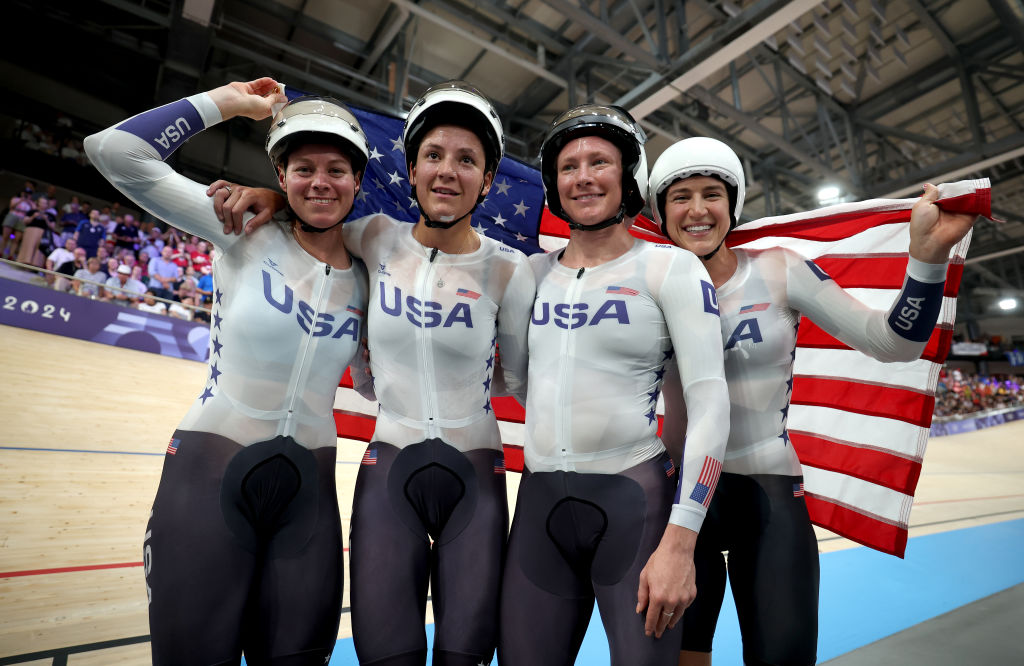 PARIS FRANCE AUGUST 07 Gold medalists Jennifer Valente Lily Williams Chloe Dygert and Kristen Faulkner of Team United States celebrate after the Womens Team Pursuit Finals on day twelve of the Olympic Games Paris 2024 at SaintQuentinenYvelines Velodrome on August 07 2024 in Paris France Photo by Jared C TiltonGetty Images
