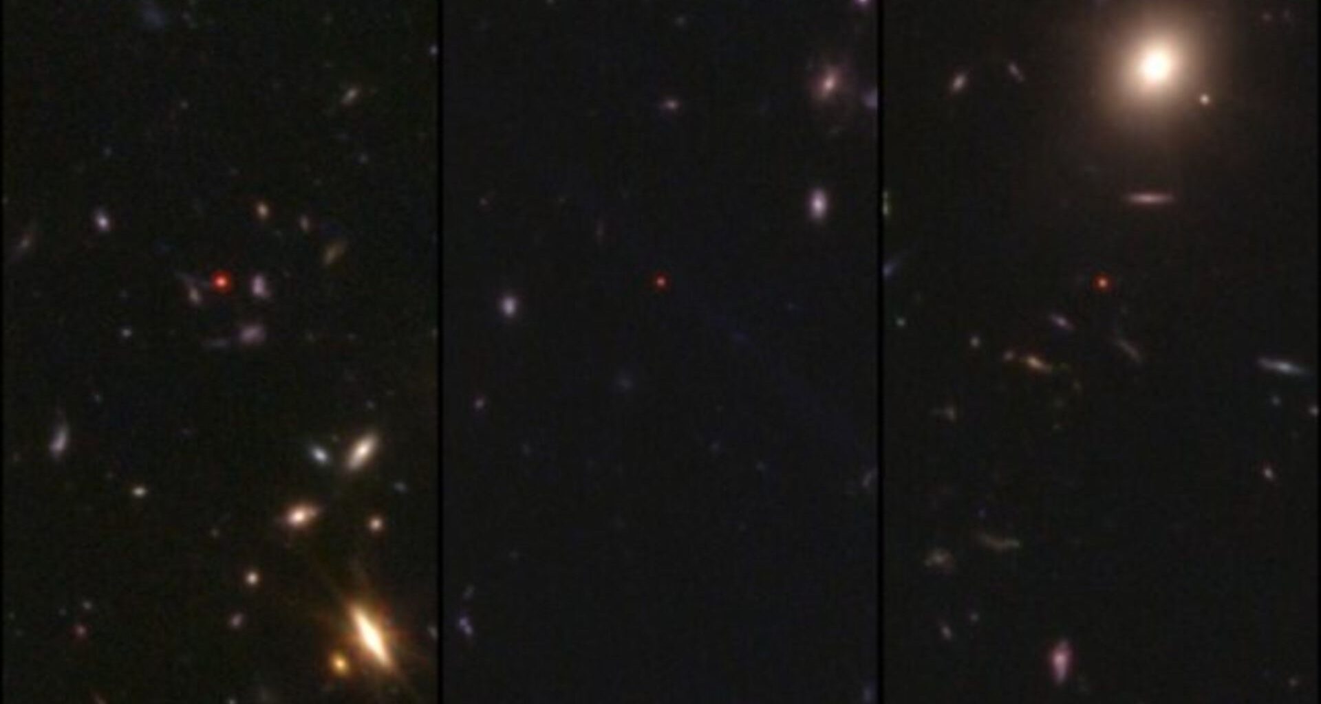A deep space image showing the glow of stars and galaxies against a black background along with little red dots throughout the image.