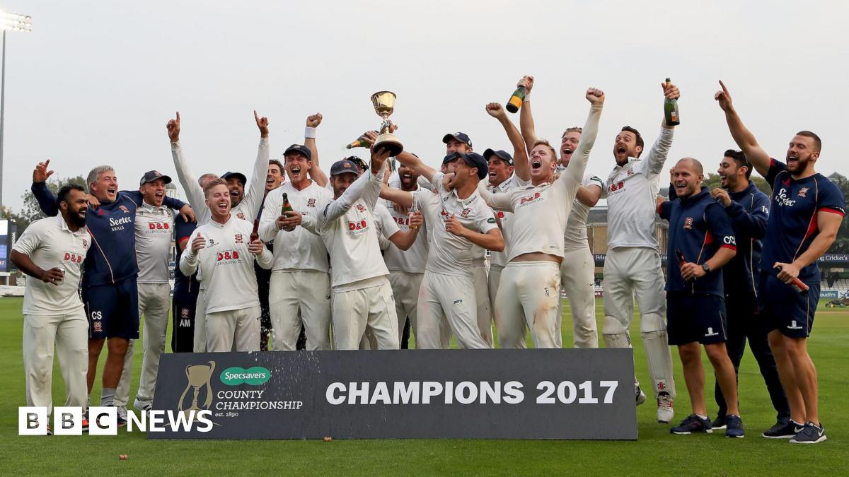 Prime Minister Mark Carney, wearing a black suit jacket, and a white button-up shirt leans his chin on his hands. He has short grey and black hair and is looking away from the camera.