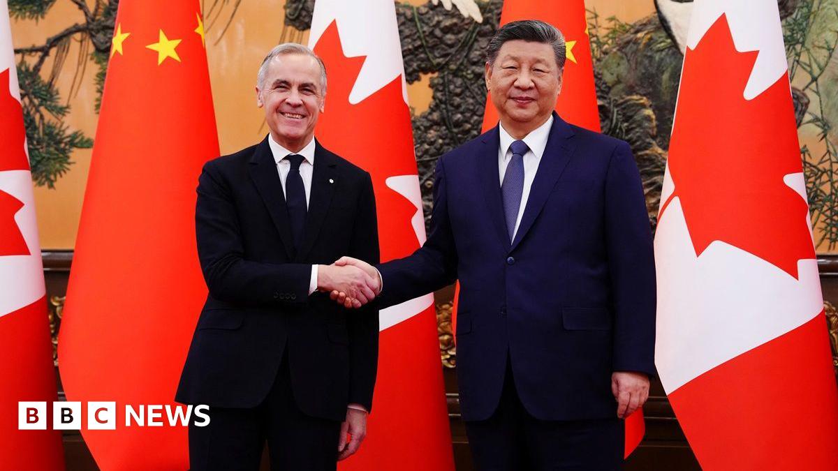 Carney and Xi shaking hands