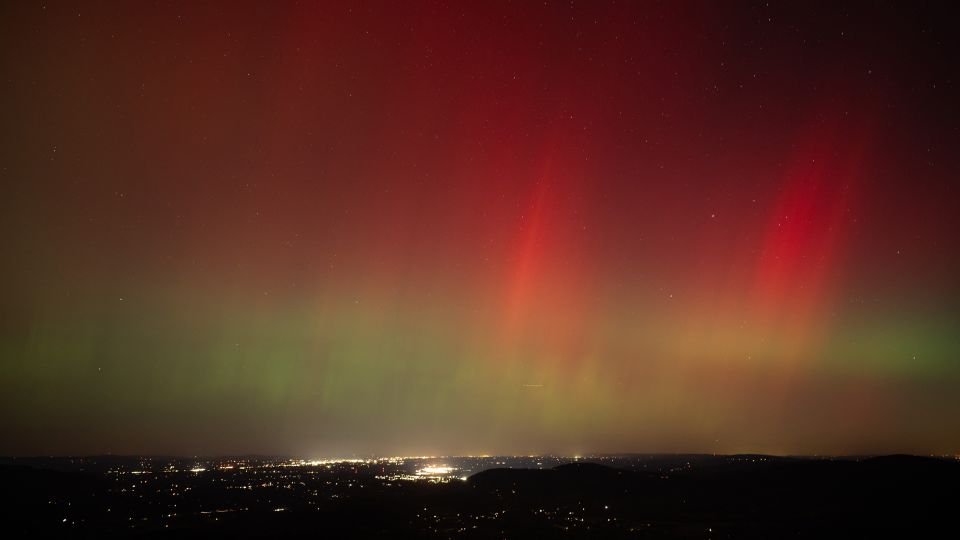Aurora borealis, or northern lights, produced by a solar geomagnetic storm are seen from Shenandoah National Park in Rileyville, Virginia, in October 2024.