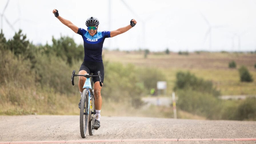 Caroline Livesey wins the first ever Scottish National Gravel Championships in August 2025. [Photo credit: Outsider Events]