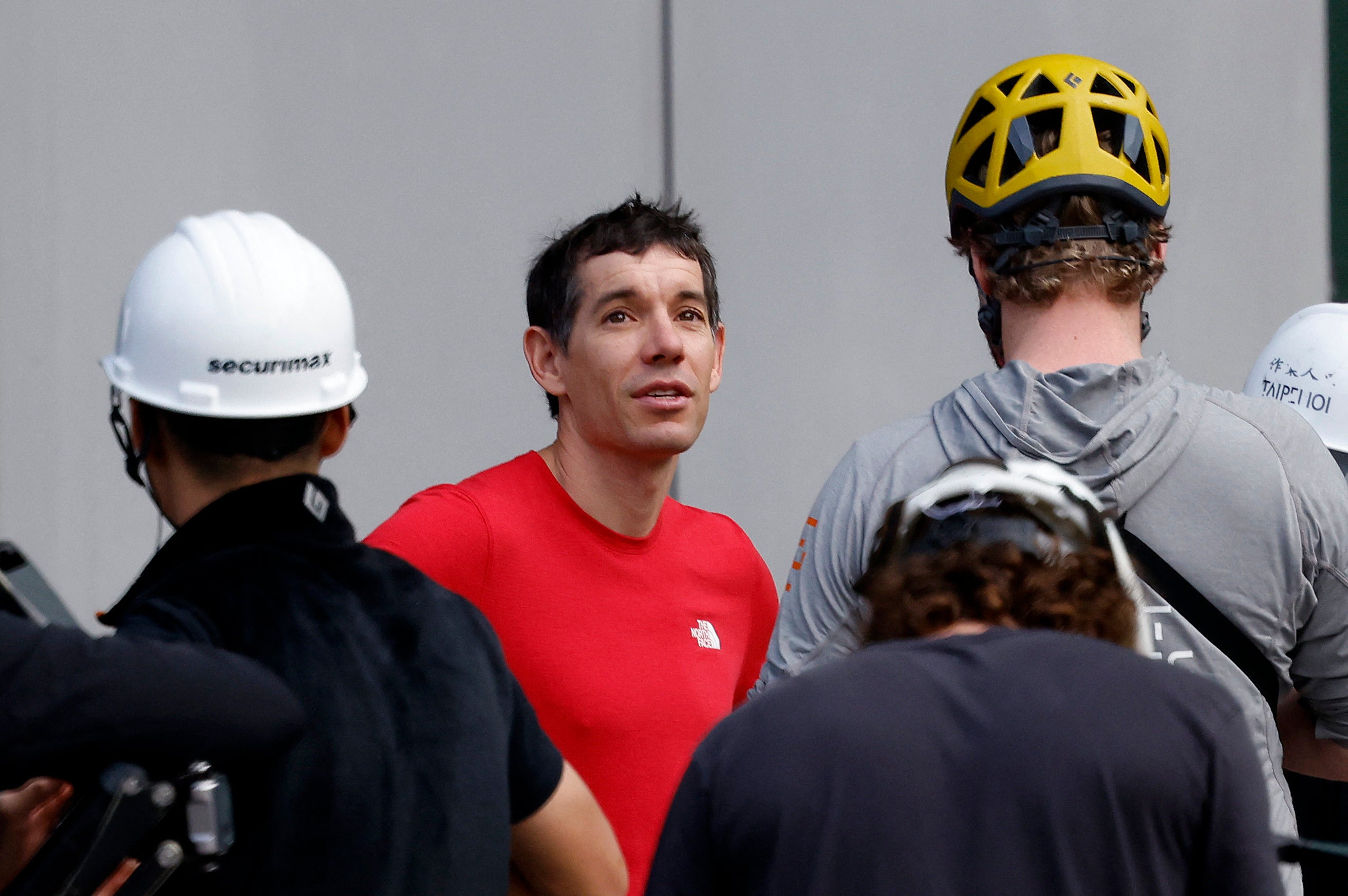 Climbing - Climber Alex Honnold free soloing Taipei 101 Skyscraper - Taipei, Taiwan - January 25, 2026 Climber Alex Honnold reacts before free soloing Taipei 101 Skyscraper