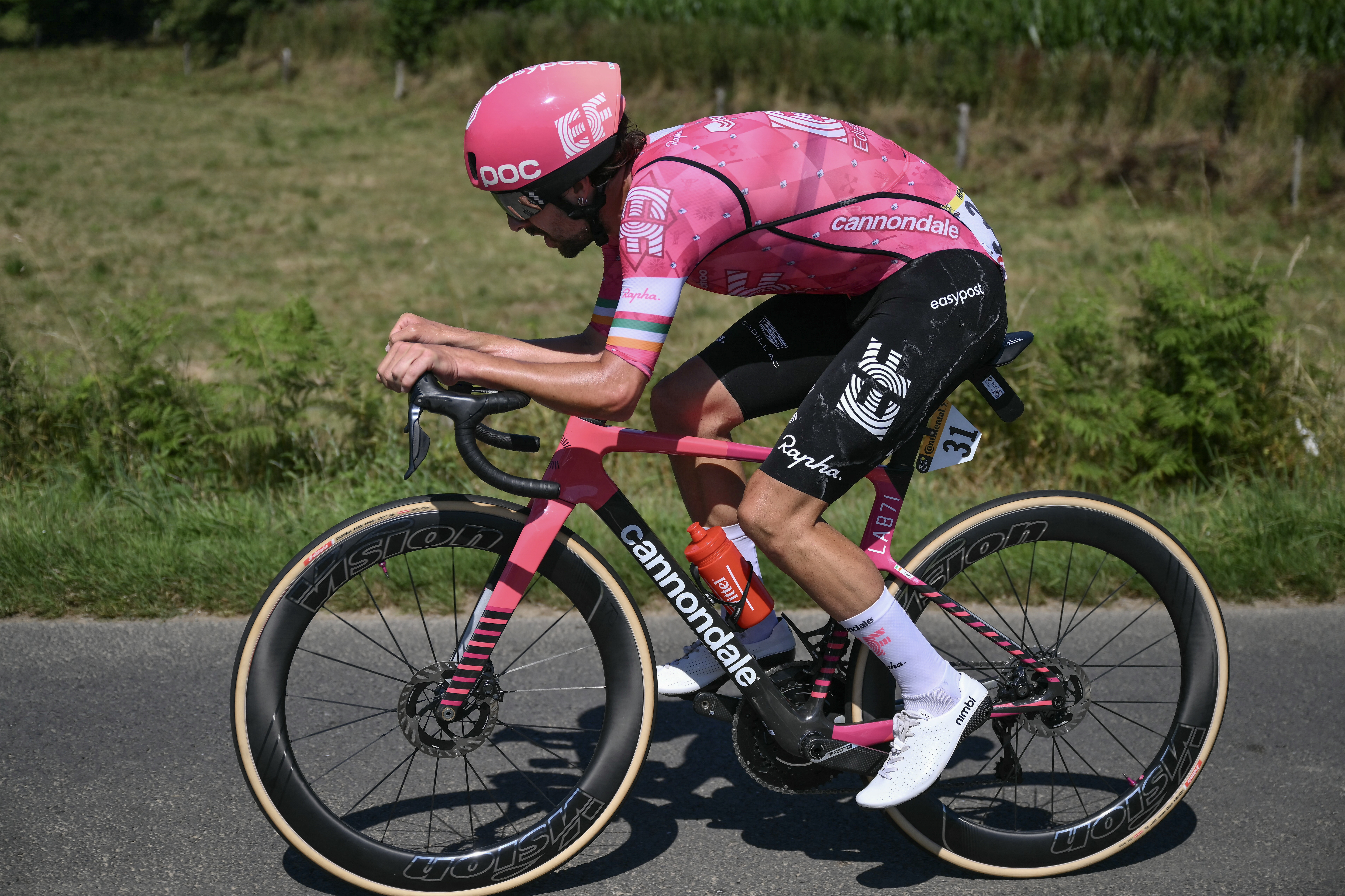 EF Education - EasyPost team's Irish rider Ben Healy cycles in a lone breakaway during the 6th stage of the 112th edition of the Tour de France cycling race, 201.5 km between Bayeux and Vire Normandie, Northwestern France, on July 10, 2025. (Photo by Marco BERTORELLO / AFP)
