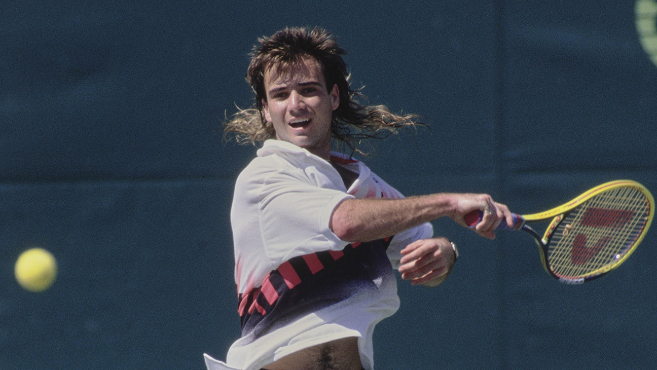 Andre Agassi from the United States plays a forehand return against Stefan Edberg of Sweden during their Men's Singles Final match at the ATP Lipton International Players Championships on 26th March 1990 at the Tennis Center at Crandon Park in Key Biscayne, Florida, United States.
