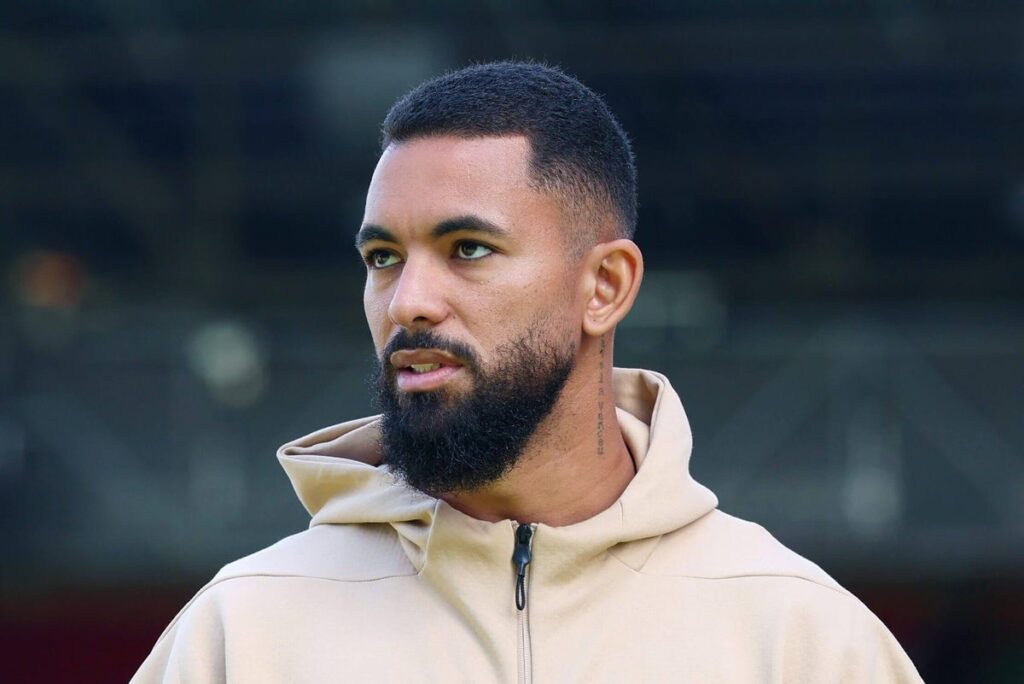 Douglas Luiz in a Nottingham Forest hoodie