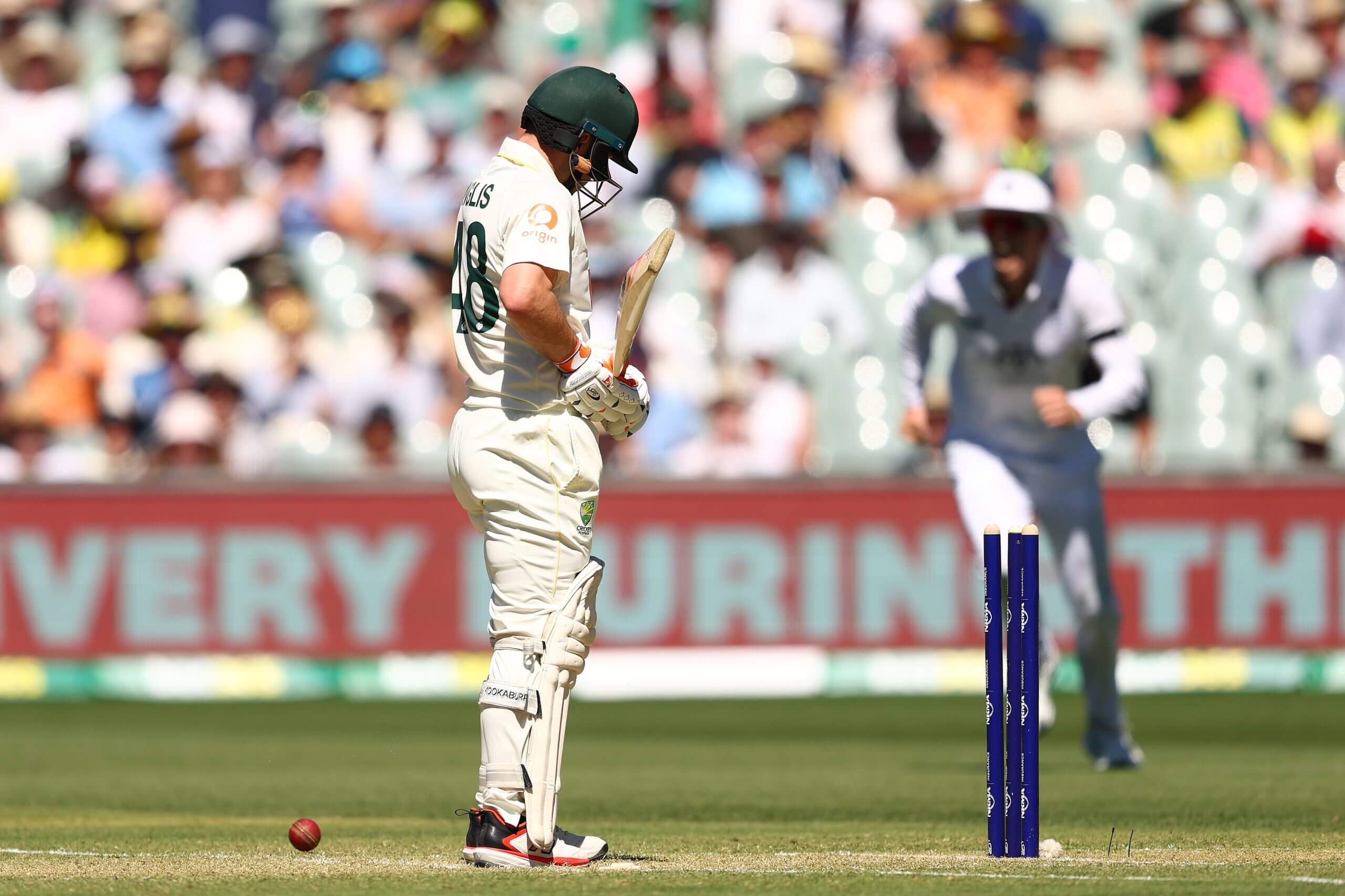Josh Inglis surveys his stumps after being bowled by Josh Tongue in Adelaide