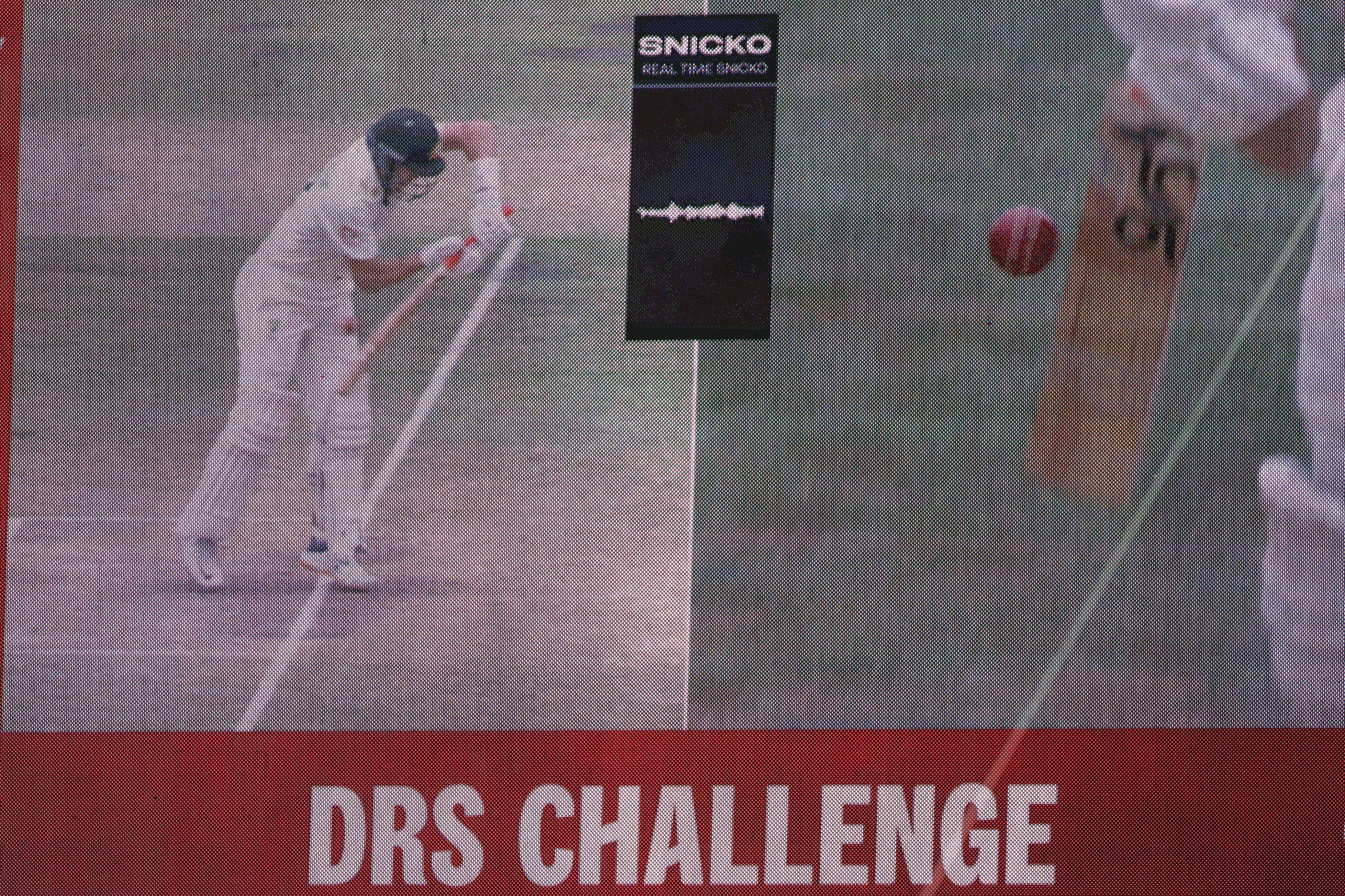 The DRS Challenge (DRS) is displayed on the big screen at Adelaide Oval for an appeal for caught behind against Marnus Labuschagne