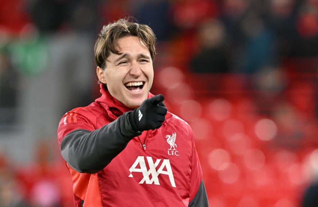 Federico Chiesa points and laughs as he warms up ahead of Liverpool's Premier League match against Leeds United at Anfield.
