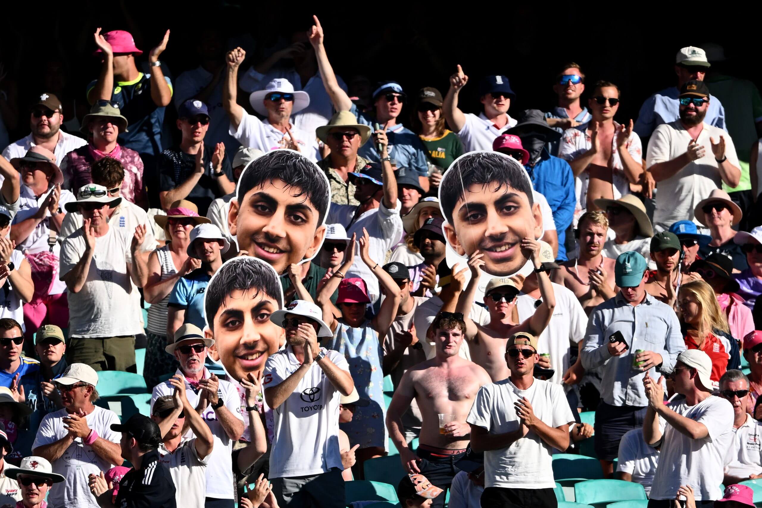 England fans wave Shoaib Bashir masks in Sydney